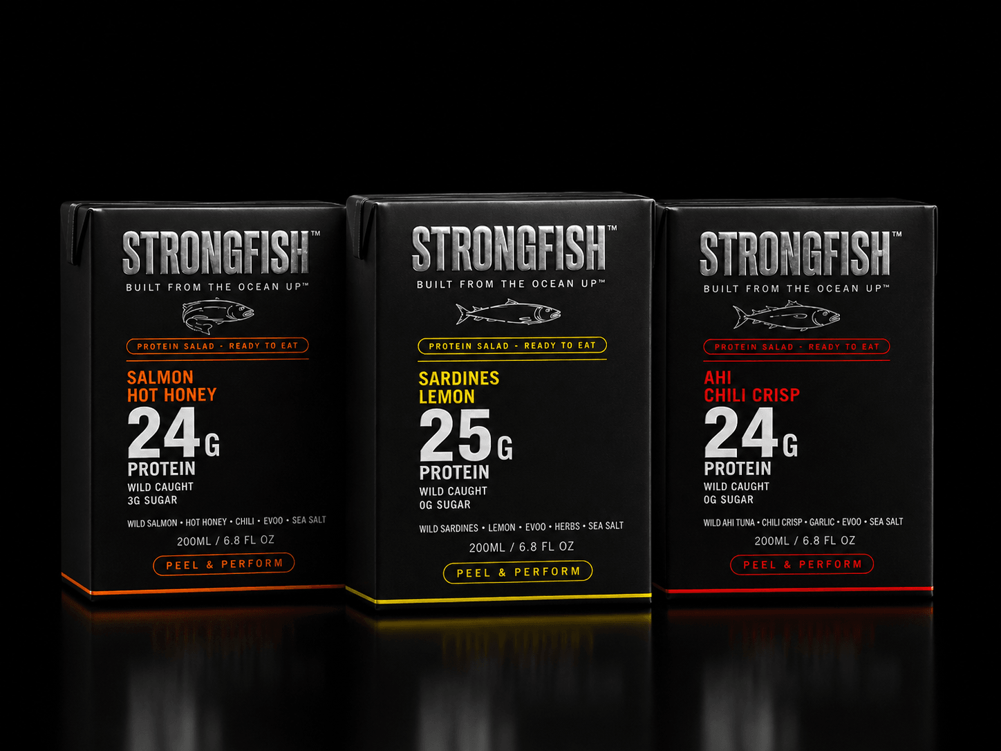 STRONGFISH lineup — Salmon Hot Honey, Sardines Lemon, Ahi Chili Crisp cartons